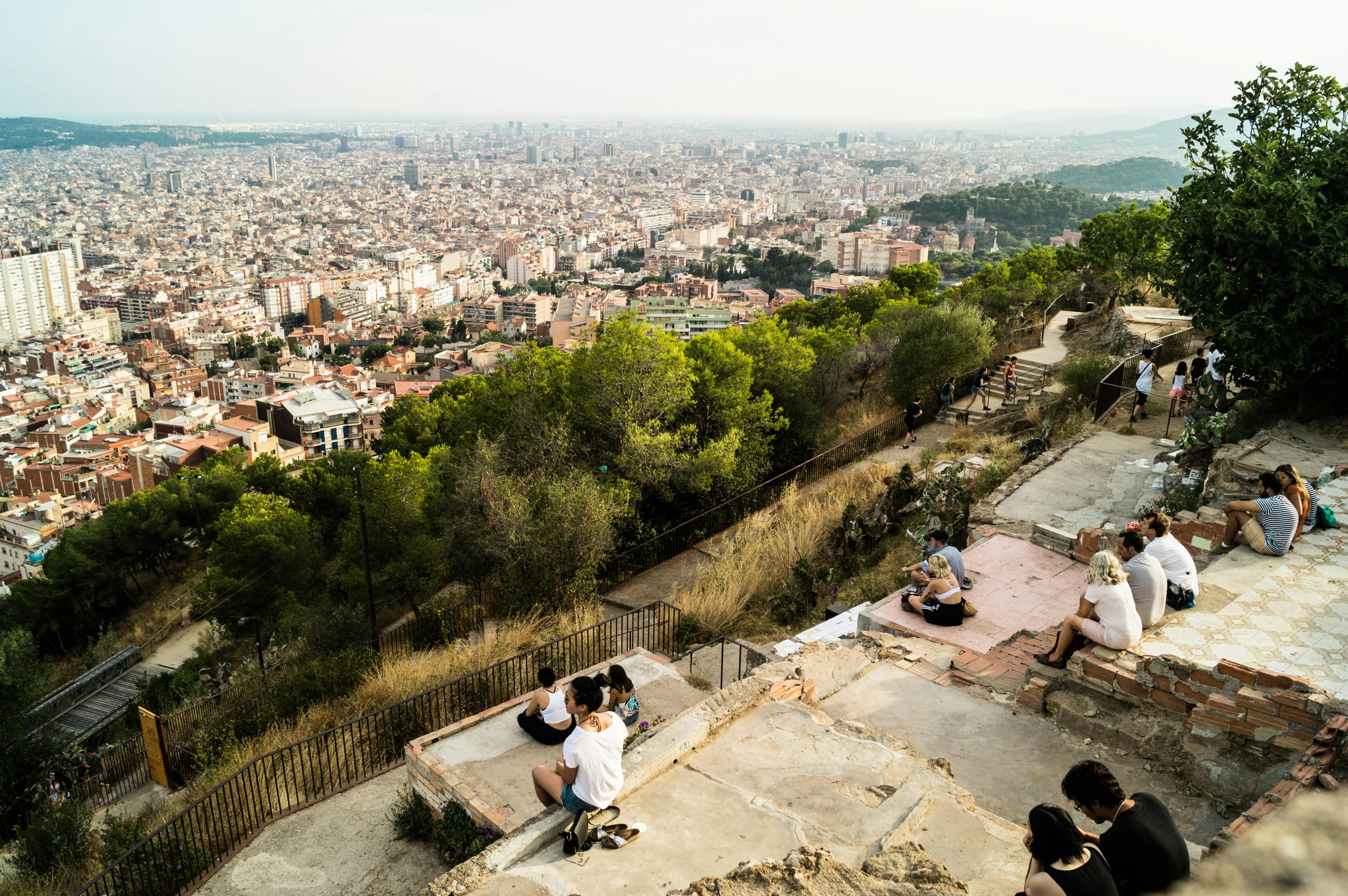 Bunkers del Carmel with people watching sunset over Barcelona